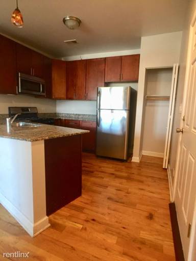 Main picture of 2038-48 W Touhy Ave & 7213-29 N Rogers Ave