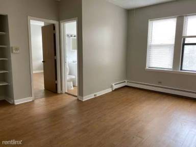Main picture of 7048-50 S Merrill Ave