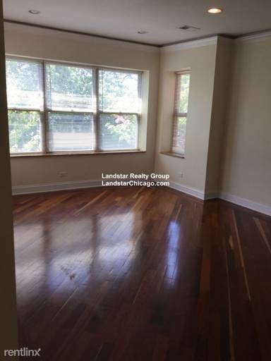 Main picture of 2038-48 W Touhy Ave & 7213-29 N Rogers Ave