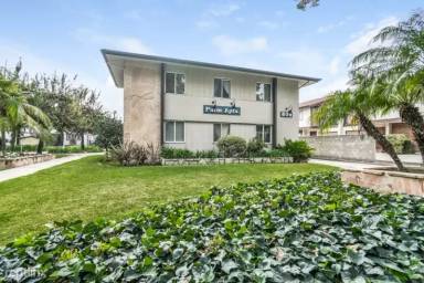 Main picture of Whispering Winds Apartments