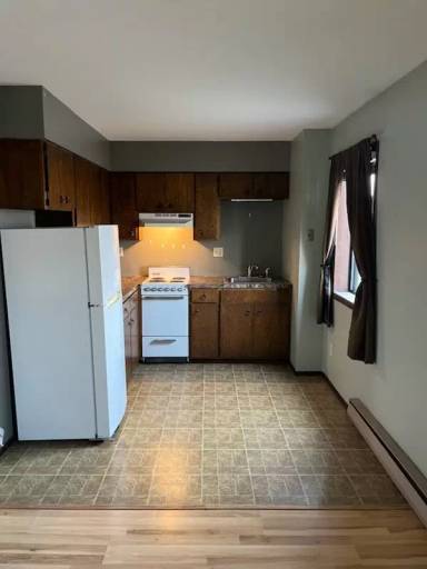 Main picture of 121 1/2 Main Ave S