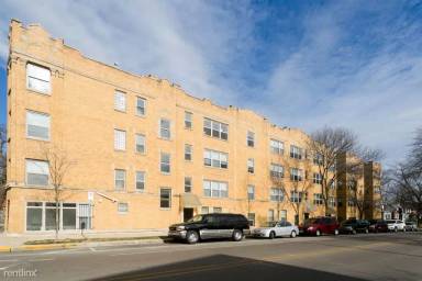 Main picture of 2038-48 W Touhy Ave & 7213-29 N Rogers Ave