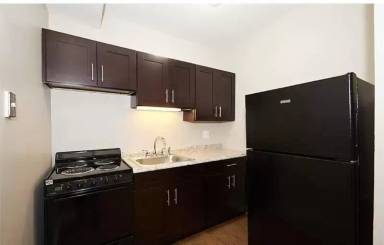 Main picture of 7048-50 S Merrill Ave
