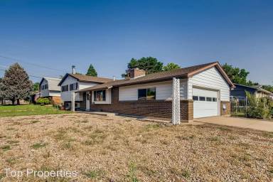 Main picture of 6389 W 64th Ave