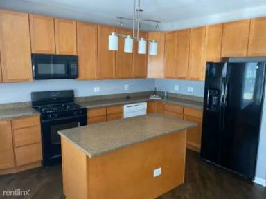 Main picture of 6700-08 S Clyde Ave & 2049-51 E 67th St