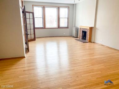 Main picture of 810 W Newport Ave & 3438 N Halsted St Apartments