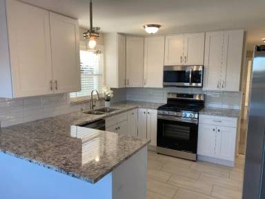 Main picture of 8729 W 73rd Pl