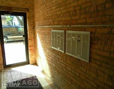 Main picture of 2038-48 W Touhy Ave & 7213-29 N Rogers Ave