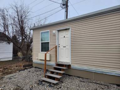 Main picture of 9 East 1st St. (A-C and House) - A