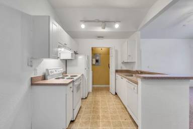 Main picture of Crescent Place at Lake Lotus Condominiums
