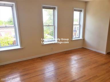 Main picture of 3034-48 W Wellington Ave & 3000-08 N Whipple St